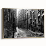 Framed canvas featuring a vintage landscape painting in black with gold accents, ideal for bedroom wall art.
