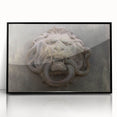 Large abstract wall art featuring swirling blue and gray tones on acrylic, framed in black.