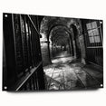 Large abstract wall art on acrylic glass featuring swirling blue and gray tones, suitable for bedroom or dining room decor.