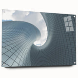 Large abstract wall art on acrylic glass, featuring swirls of blue and grey, ideal for modern bedroom or dining room decor.