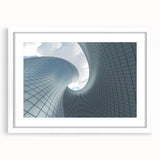 Extra large abstract art print featuring textured swirls in neutral tones, framed in white, ideal for living room decor.