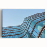Urban skyline canvas prints – Sleek curved glass building photo