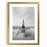 Cityscape photography prints – Iconic spire above the city clouds