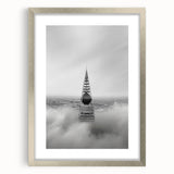 Cityscape photography prints – Iconic spire above the city clouds