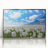 Vibrant floral canvas print showcasing colorful blossoms in a modern design, perfect for home decor, displayed against a neutral background.