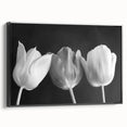 Vibrant floral canvas art showcasing a colorful arrangement of blooming flowers in shades of pink, yellow, and blue, perfect for enhancing home decor.