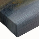 Close-up of a stretched canvas wall art piece showcasing an abstract landscape design with vibrant colors and fluid shapes, ideal for modern decor.