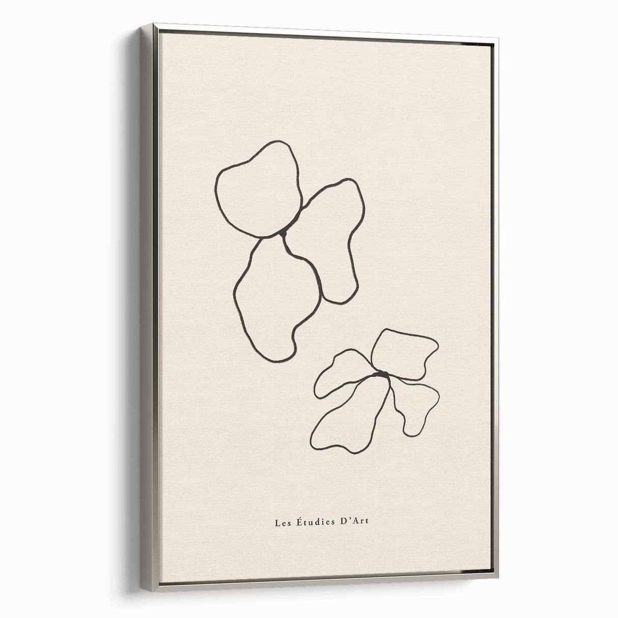 Framed abstract minimalist wall art featuring a silver side profile design, showcasing modern geometric shapes and elegant colors in a sleek setting.