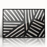 Framed abstract minimalist wall art design in black and white, showcasing geometric shapes and lines, perfect for modern home decor. This acrylic piece adds a stylish touch to any interior space, enhancing visual aesthetics.