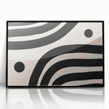 Framed minimalist wall art featuring an abstract black design, showcasing a sleek, modern aesthetic. Ideal for contemporary decor in living spaces or offices.
