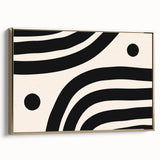Framed minimalist wall art featuring an abstract design with gold accents, displayed from the side to showcase its sleek profile and elegant finish.