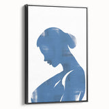 Framed minimalist wall art featuring an abstract design in black, showcasing geometric shapes and clean lines, enhancing modern decor.