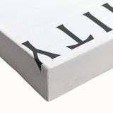 Close-up of an abstract minimalist wall art design on stretched canvas, showcasing soft pastel colors and fluid shapes for modern decor.