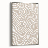 Framed abstract minimalist wall art design featuring a silver frame and a sleek canvas print, showcasing elegant lines and soft colors.