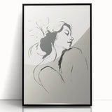 Framed acrylic wall art showcasing an abstract minimalist design with bold black lines and geometric shapes, perfect for modern home decor.