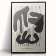 Framed abstract minimalist wall art featuring a sleek black design, showcasing geometric shapes and clean lines, perfect for modern home decor.