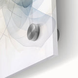 Close-up of an abstract minimalist wall art piece showcased in acrylic glass, featuring subtle earth tones and geometric shapes, perfect for modern decor.