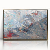Framed abstract wall art featuring colorful paint splatters on a gold-accented background, adding a modern touch to any decor.