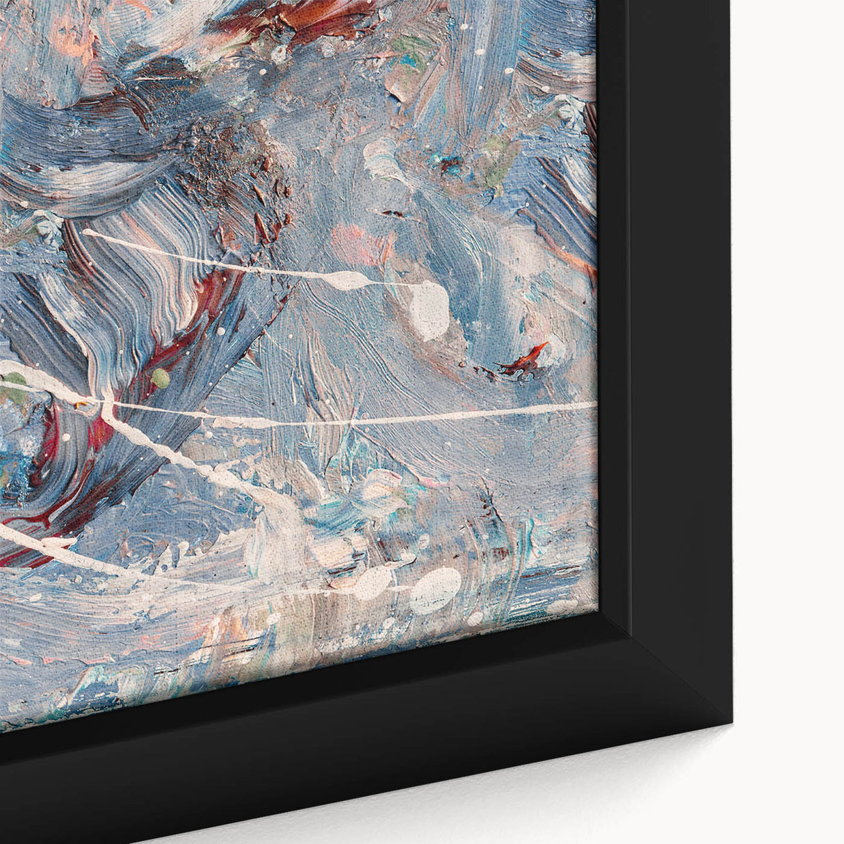 Close-up of a framed abstract splatter wall art piece showcasing vibrant colors and dynamic shapes, perfect for modern interior decor.