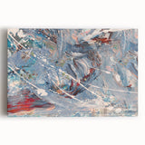 Colorful abstract splatter wall art on stretched canvas, showcasing vibrant hues of blue, orange, and yellow, ideal for modern home decor.