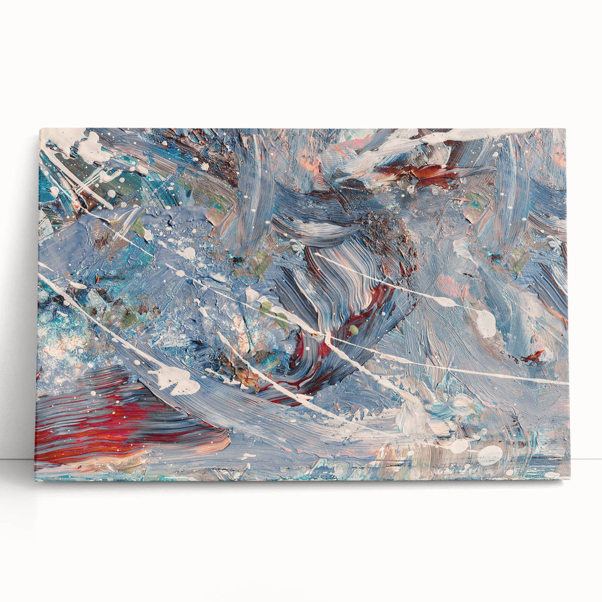 Abstract canvas wall art featuring vibrant splatter designs in shades of blue, yellow, and pink, ideal for modern home decor and artistic expression.
