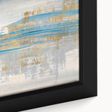 Close-up of a framed abstract wall art piece showcasing colorful strokes and lines, emphasizing vibrant hues and dynamic textures in a modern design.