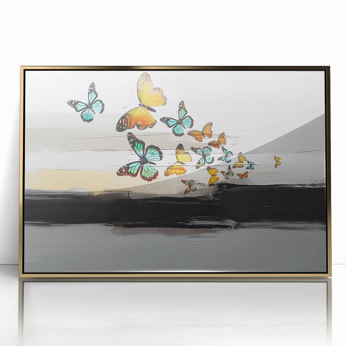 Framed abstract wall art showcasing vibrant strokes and lines in gold and black, adding a modern touch to contemporary decor.