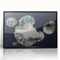 Framed acrylic wall art featuring an abstract design of colorful strokes and lines, set against a black background, ideal for modern home decor.