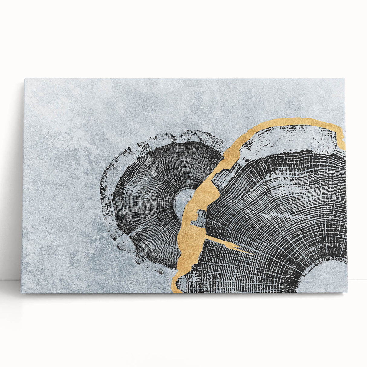 Abstract strokes and lines in vibrant colors adorn a stretched canvas wall art piece, leaning against a neutral wall, perfect for modern decor.