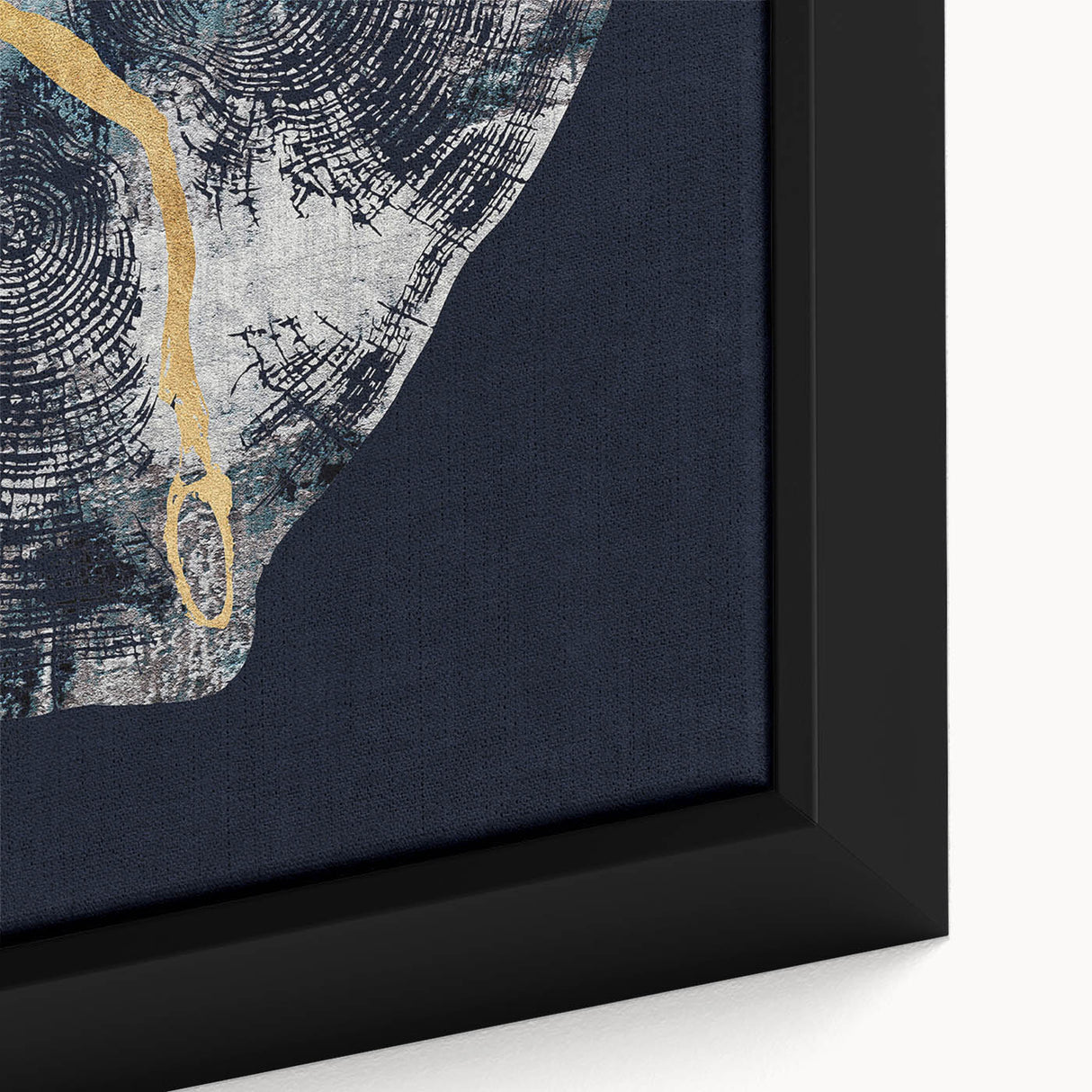 Close-up of a framed canvas artwork featuring an abstract design with dynamic strokes and lines in vibrant colors, ideal for modern home decor.