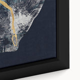 Close-up of a framed canvas artwork featuring an abstract design with dynamic strokes and lines in vibrant colors, ideal for modern home decor.