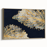 Framed canvas wall art showcasing an abstract design of gold strokes and lines, adding a modern touch to contemporary decor with elegant side view details.