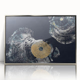 Framed wall art design featuring abstract strokes and lines in silver and grey hues, perfect for modern decor, showcasing a sleek acrylic finish.