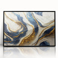 Framed abstract wall art featuring vibrant strokes and lines in black and white, adding a modern touch to any interior decor.