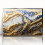 Framed abstract wall art featuring dynamic silver strokes and lines against a textured background, perfect for modern home decor.