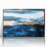 Framed wall art featuring an abstract design with colorful strokes and lines, set in a sleek silver frame, ideal for modern decor.