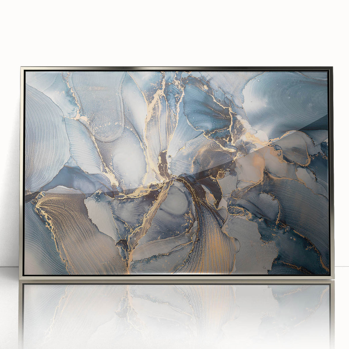Framed abstract wall art featuring dynamic strokes and lines in silver tones, adding a modern touch to any interior decor.