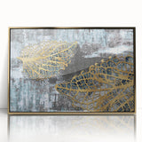 Framed wall art piece showcasing an abstract design of gold strokes and lines on a white background, ideal for modern home decor, enhancing elegance and style.
