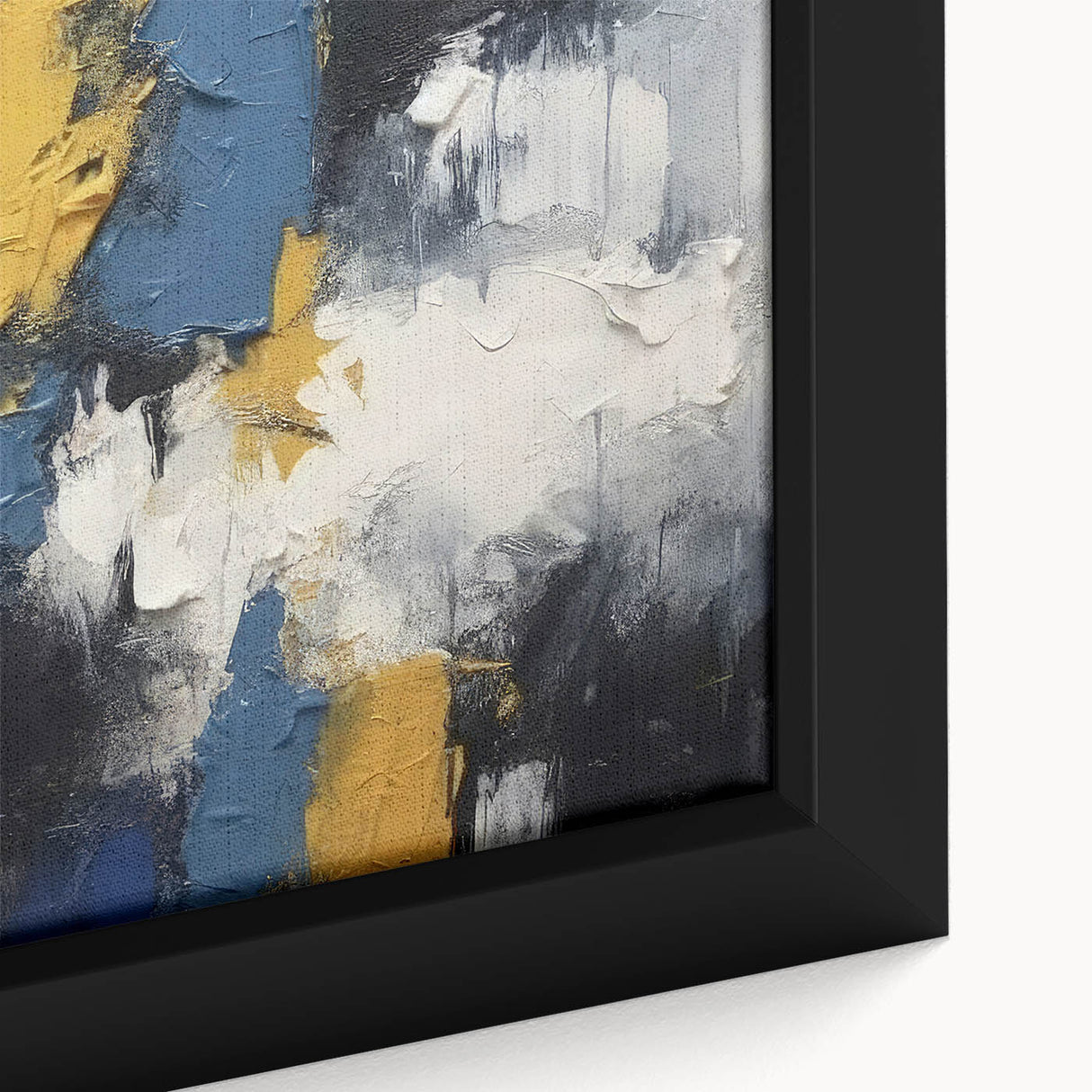 Close-up of framed abstract wall art showcasing vibrant strokes and lines in blue, orange, and yellow, perfect for modern decor.