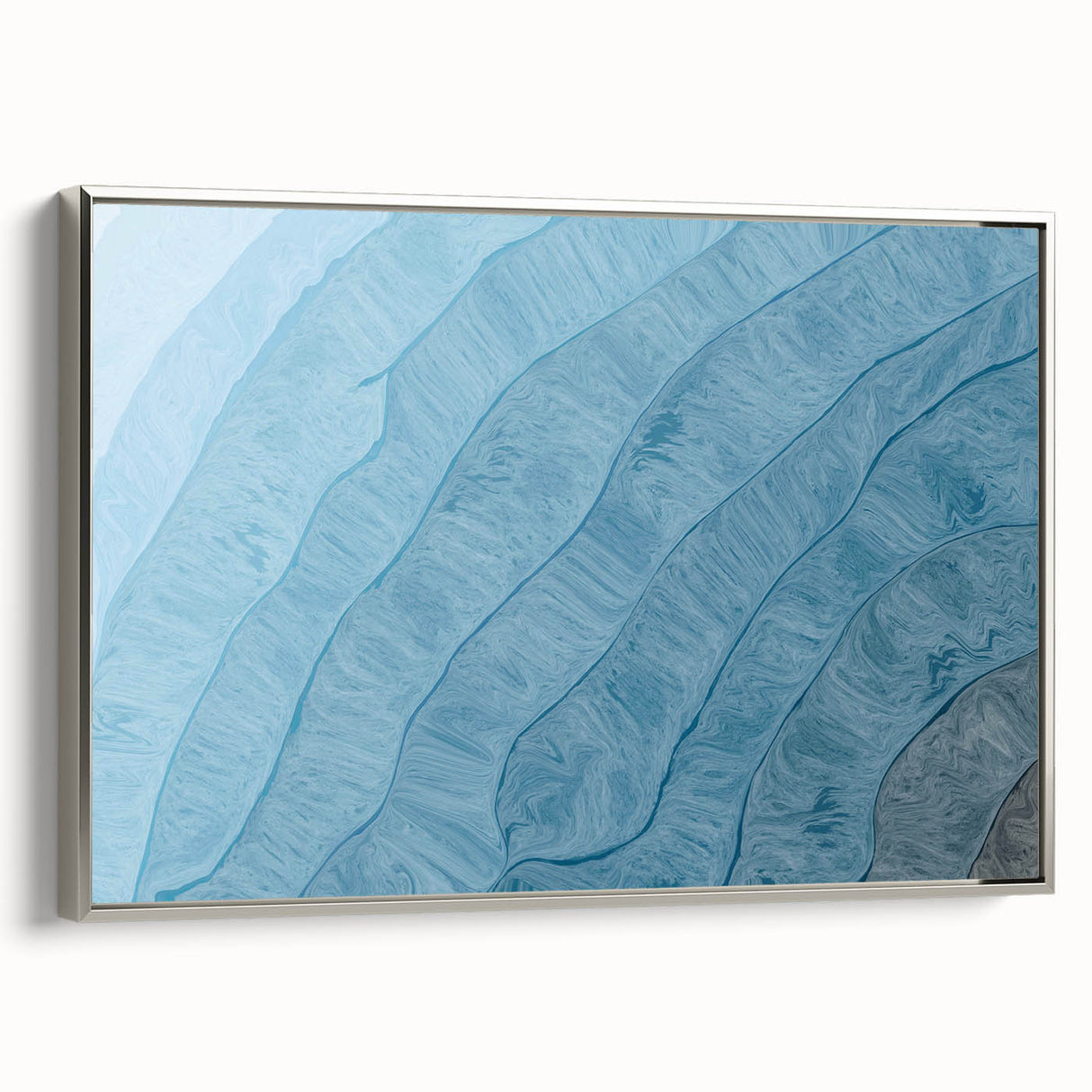 Framed wall art showcasing an abstract design of colorful strokes and lines, set in a sleek silver frame. Ideal for modern decor, adding elegance to any space.