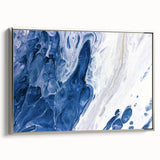 Framed canvas wall art showcasing an abstract design of silver strokes and lines, perfect for modern decor. Side view highlights the sleek frame and textured surface.