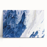 Abstract wall art design featuring colorful strokes and lines on stretched canvas, leaning against a wall, adding a modern touch to interior decor. Perfect for contemporary spaces.