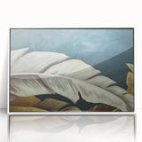 Framed acrylic wall art featuring an abstract design of colorful strokes and lines, set against a white background, perfect for modern home decor.