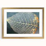 Abstract strokes and lines design wall art in a gold frame, featuring a modern aesthetic with a mat. Perfect for enhancing contemporary home decor.