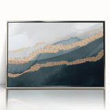 Framed wall art featuring an abstract design of colorful strokes and lines in silver and blue hues, perfect for modern home decor.