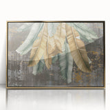 Framed acrylic wall art featuring an abstract design of gold strokes and lines, adding a modern touch to home decor, ideal for contemporary settings.