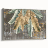 Framed canvas wall art showcasing an abstract design of colorful strokes and lines in shades of blue, orange, and gold, presented in a sleek silver frame for contemporary decor.