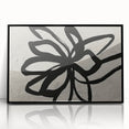 Framed acrylic wall art showcasing an abstract design of colorful strokes and lines, featuring a sleek black frame, perfect for modern home décor.