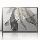Framed acrylic wall art featuring an abstract design of colorful strokes and lines in silver tones, perfect for modern home decor or office spaces.