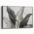 Framed canvas wall art showcasing an abstract design with dynamic strokes and lines in a modern black frame, perfect for contemporary home decor.